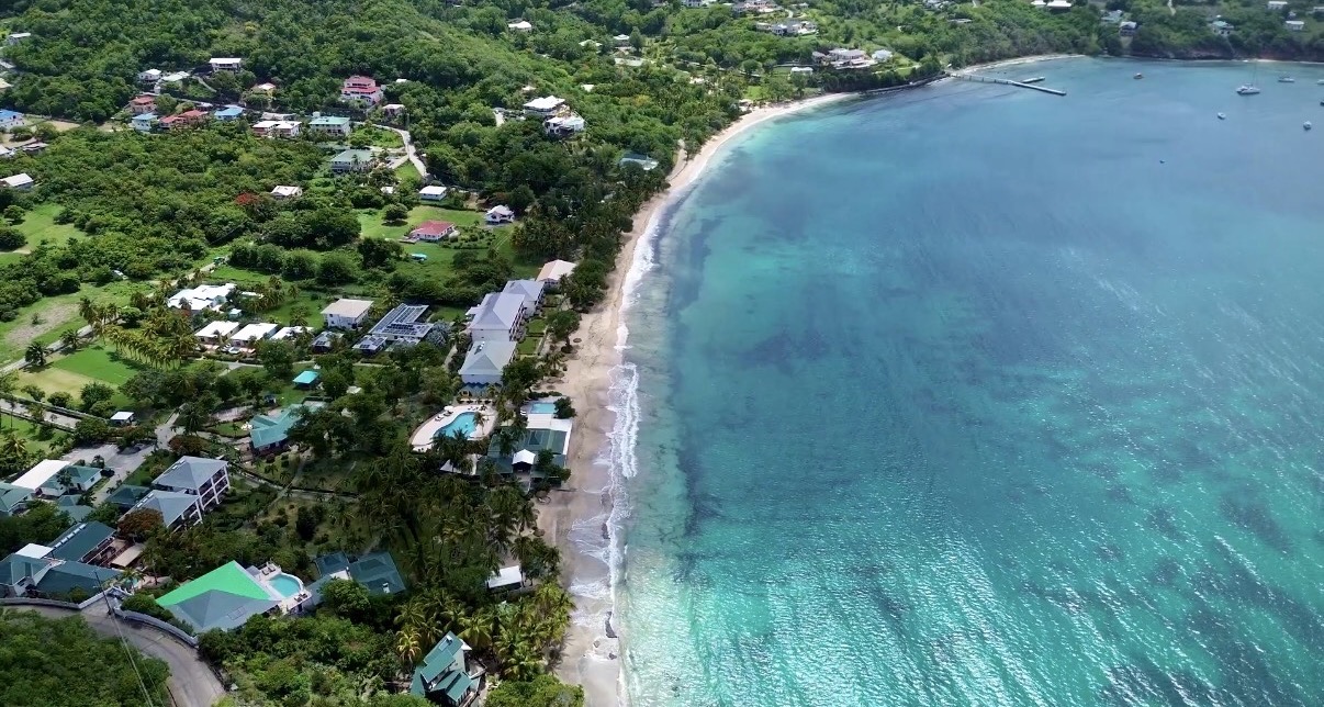 Aerial view of Bequia's coastline and turquoise water